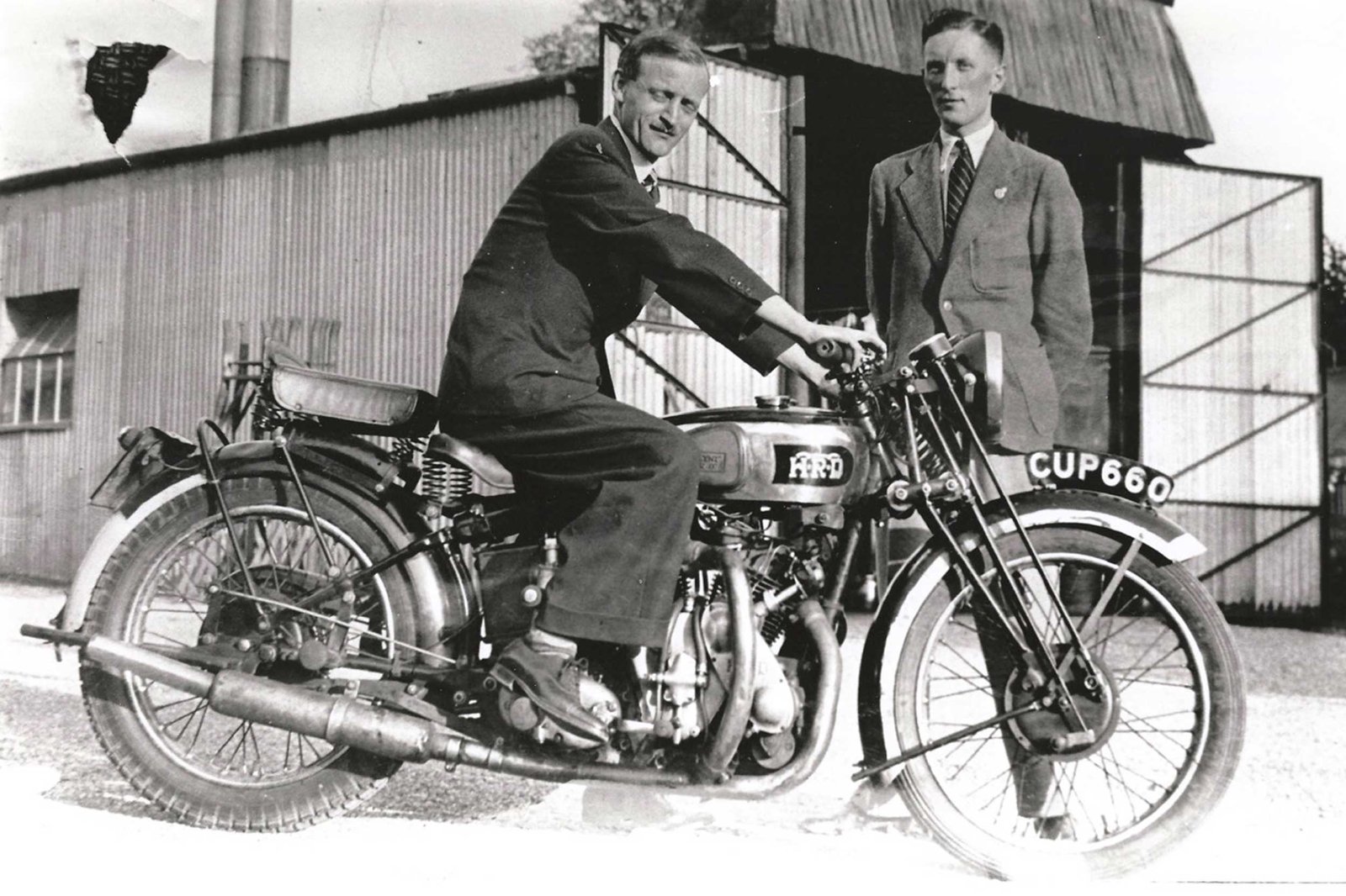 1938 and Philip Vincent sits astride a Vincent Rapide