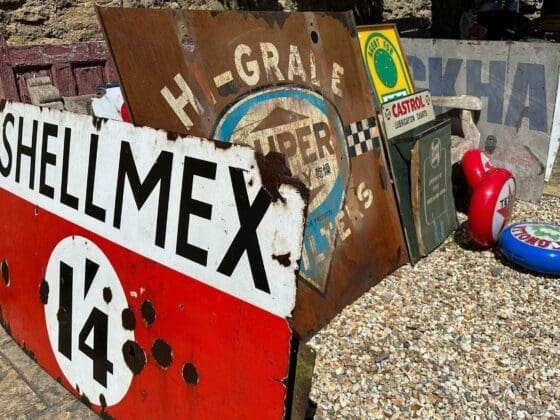 Enamel signs at automobilia auction